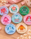 Badge "Journée du pull moche". Petit cadeau